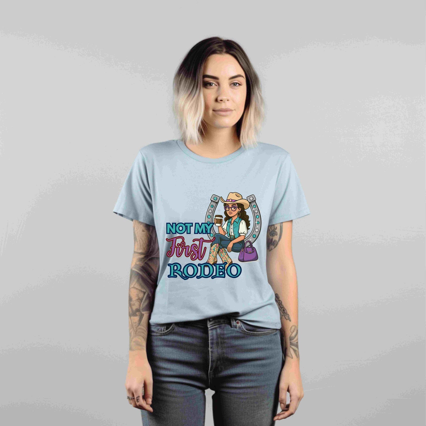 “Not My First Rodeo” Cowgirl Graphic T-Shirt – Western Rodeo Tee for Women with Coffee & Sass